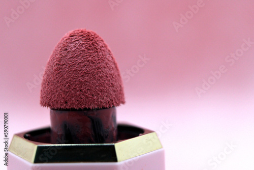 Liquid blusher on pink background