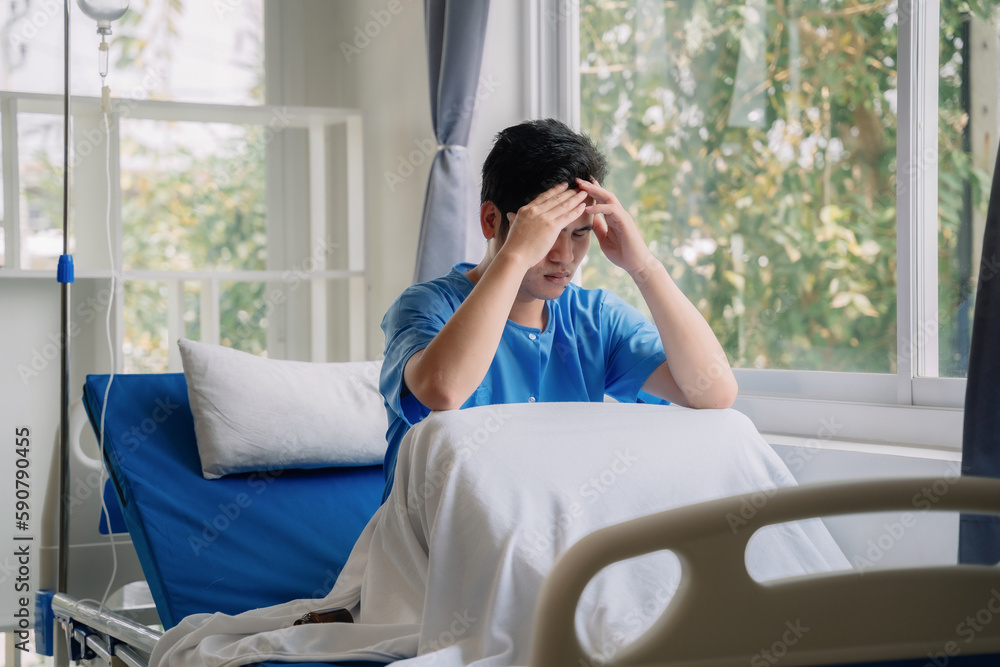 Patient sitting in bed holding pills, having stress, boredom, loneliness, anxiety/health care and medicine. Patient sitting in bed holding pills, having stress, boredom, loneliness, anxiety/health care and medicine.