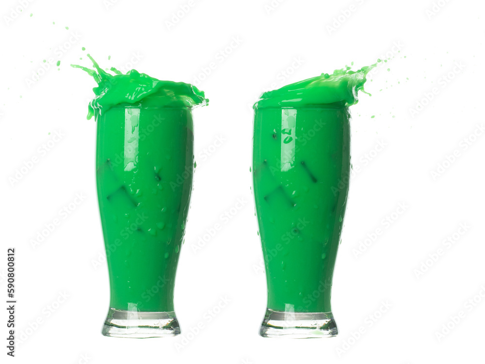 Green Matcha Milk Tea pour fall down, explosion in air. Green Matcha Milk Tea spill splash in shape glass bowl as paint color. White background isolated high speed shutter freeze motion Green Matcha Milk Tea pour fall down, explosion in air. Green Matcha Milk Tea spill splash in shape glass bowl as paint color. White background isolated high speed shutter freeze motion