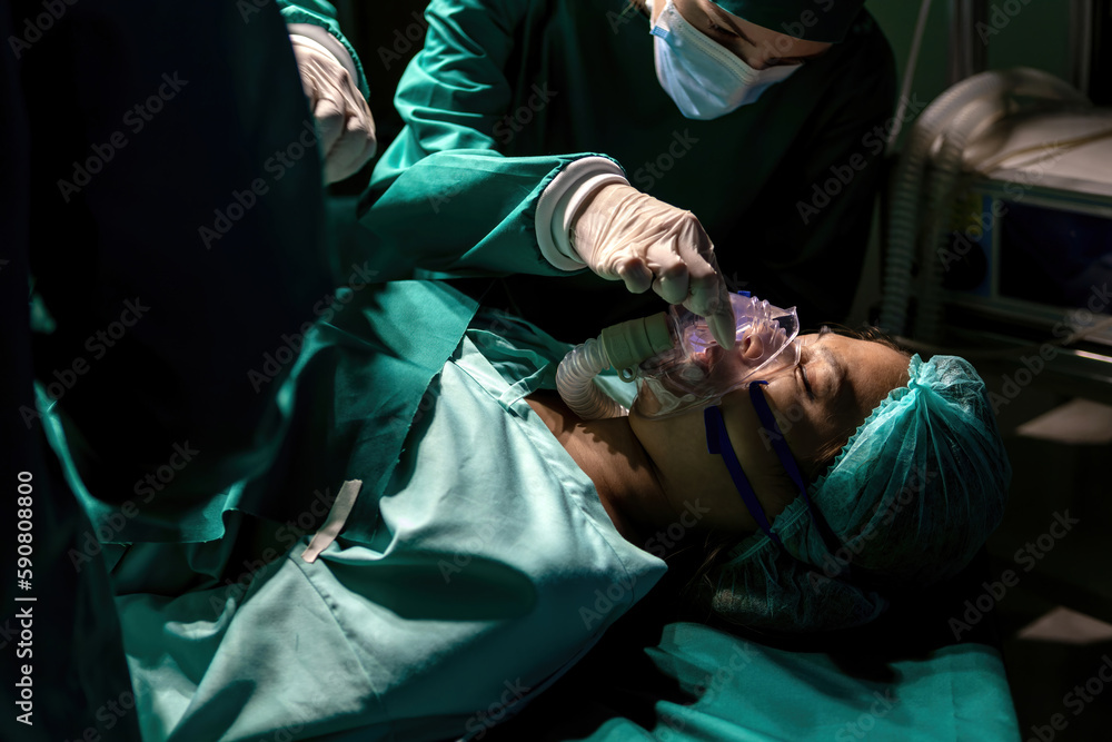 patient wearing oxygen mask lying sleeping after getting anesthesia