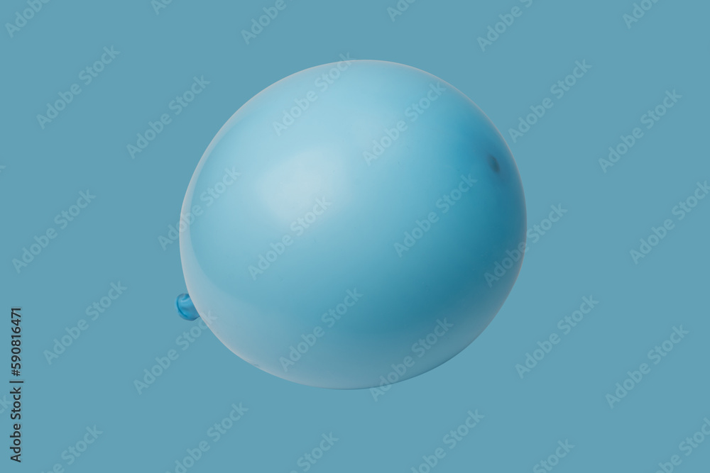 Blue ballon isolated on a blue background. Blue ballon isolated on a blue background.