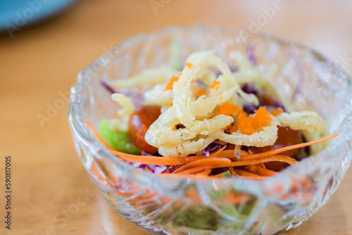 Shirauo Salad or Silverfish Salad in a bowl. Selcetive focus. photo