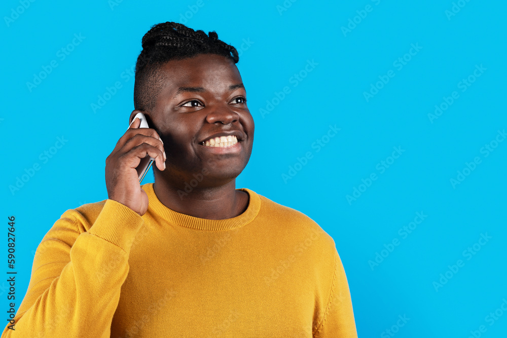 Mobile Communication. Cheerful African American Man Talking On Cellphone And Looking Away Mobile Communication. Cheerful African American Man Talking On Cellphone And Looking Away