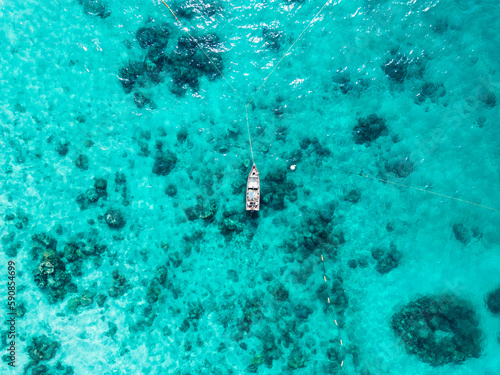 Aerial view of a boat in the picturesque bay 
