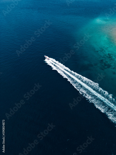 aerial top view luxury yacht sailing in sea . © Sarawin