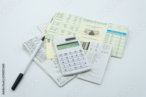 Tax related concept with various utility bills and receipts