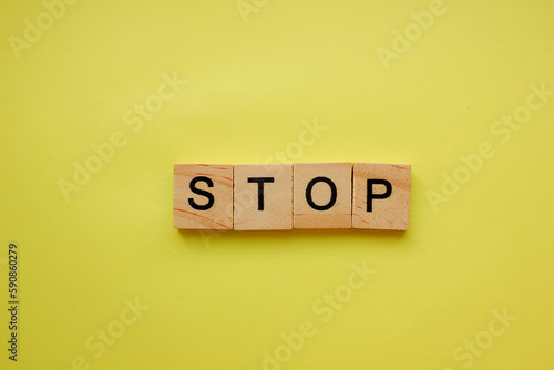 The word STOP on a yellow background.