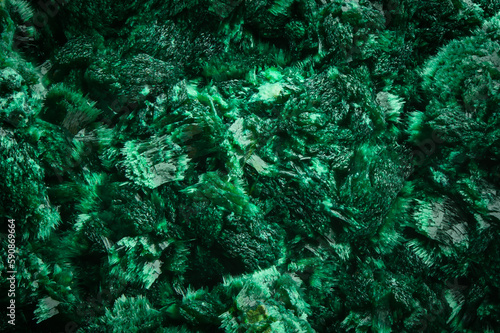 Malachite. green macro detail texture background. close-up raw rough unpolished semi-precious gemstone