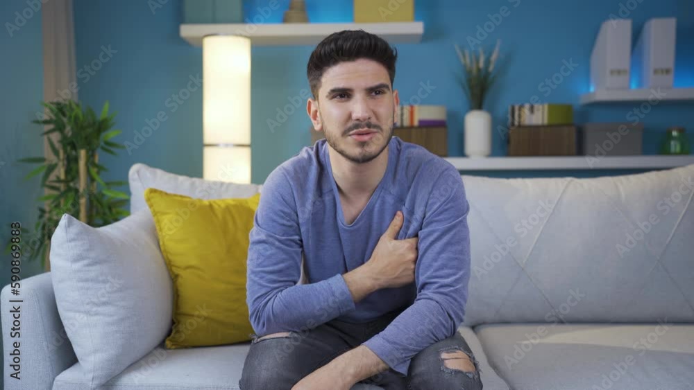 Young man suffering from love gets emotional.
Young man alone at home is overcoming the pain of separation sad and depressive.
Young man suffering from love gets emotional.
Young man alone at home is overcoming the pain of separation sad and depressive.