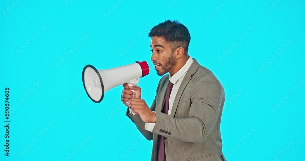 Speaker, loud and businessman shouting on a megaphone making an announcement isolated in a blue studio background. Frustration, audio and screaming man speaking on a voice broadcast or speech Speaker, loud and businessman shouting on a megaphone making an announcement isolated in a blue studio background. Frustration, audio and screaming man speaking on a voice broadcast or speech