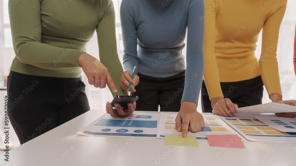 Fototapeta premium Group of ui ux developer brainstorming website wireframe mobile interface design on desk table.
