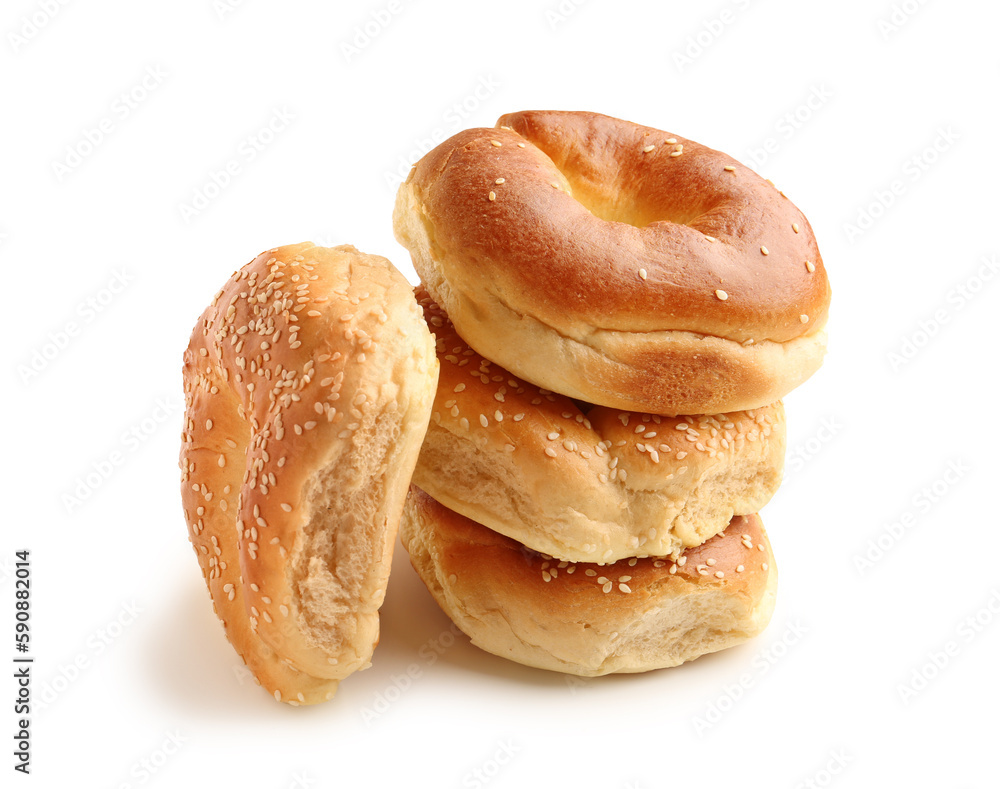 Tasty bagels with sesame seeds on white background Tasty bagels with sesame seeds on white background