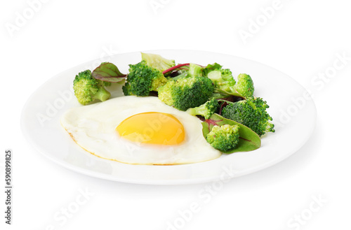 Plate with tasty fried egg, broccoli and spinach on white background