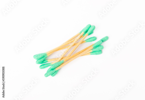 Cotton swabs isolated on white background. Bamboo cotton buds. Means for hygiene of ears. Eco friendly materials.