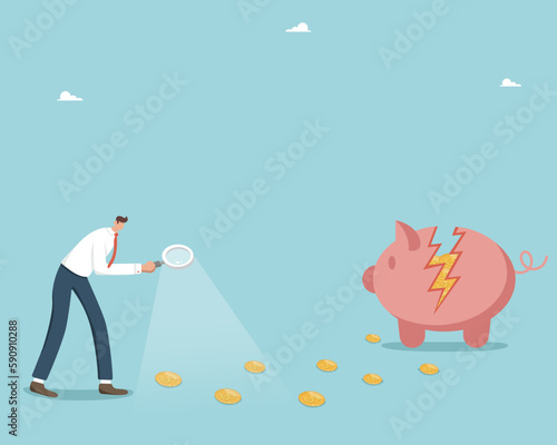 Recession and economic crisis, inflation or decrease in the value of money, stock market crash and bankruptcy, a man with a magnifying glass sees coins on the floor that lead to a broken piggy bank.