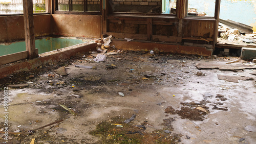 The floor, the interior, of an abandoned ruined old building