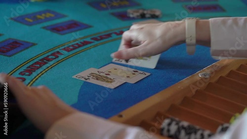 Black jack table. Gambling, betting. Casino. Dealer and playing cards.