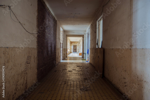 Dark corridor of old shabby dorm or appartment house