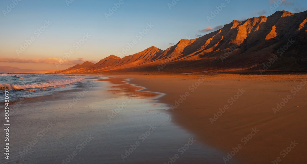 Naklejka premium Cofete Beach at sunset on the Canary Island Fuerteventura, Spain.