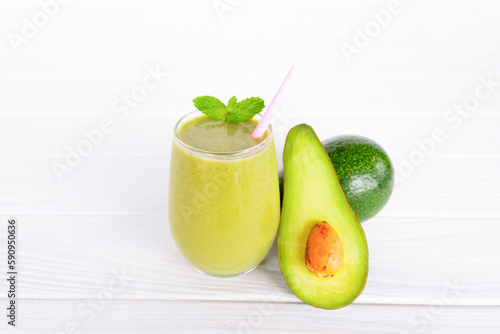 Avocado fresh cocktail smoothies fruit juice beverage healthy the taste yummy in glass drink episode good morning on wooden background.
