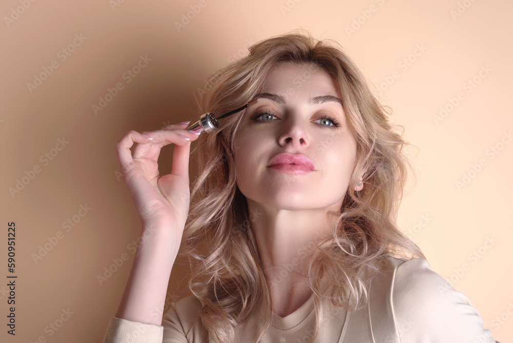 Eyebrow makeup. Beauty model shaping brows with brow pencil closeup. Womans eyebrows with eyebrow brush. Natural make up. Modeling brows. Comb eyebrows. Eyebrow makeup. Beauty model shaping brows with brow pencil closeup. Womans eyebrows with eyebrow brush. Natural make up. Modeling brows. Comb eyebrows.