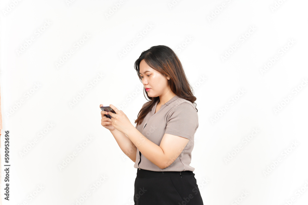 Playing Mobile Game on Smartphone Of Beautiful Asian Woman Isolated On White Background Playing Mobile Game on Smartphone Of Beautiful Asian Woman Isolated On White Background