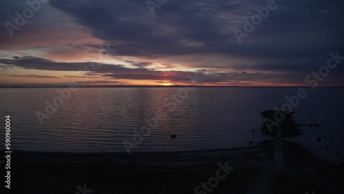 Time Lapse of beautiful sunset in golden hour from Barseback strand, Sweden photo