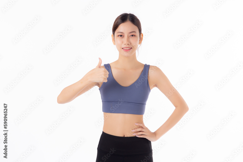 Portrait beautiful young asian woman in sportwear smile and thumbs up isolated on white background, sport and training exercise for health, female fitness workout for slimming and confident. Portrait beautiful young asian woman in sportwear smile and thumbs up isolated on white background, sport and training exercise for health, female fitness workout for slimming and confident.
