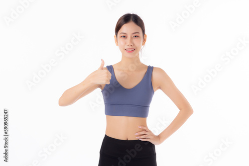 Portrait beautiful young asian woman in sportwear smile and thumbs up isolated on white background, sport and training exercise for health, female fitness workout for slimming and confident. © N_studio