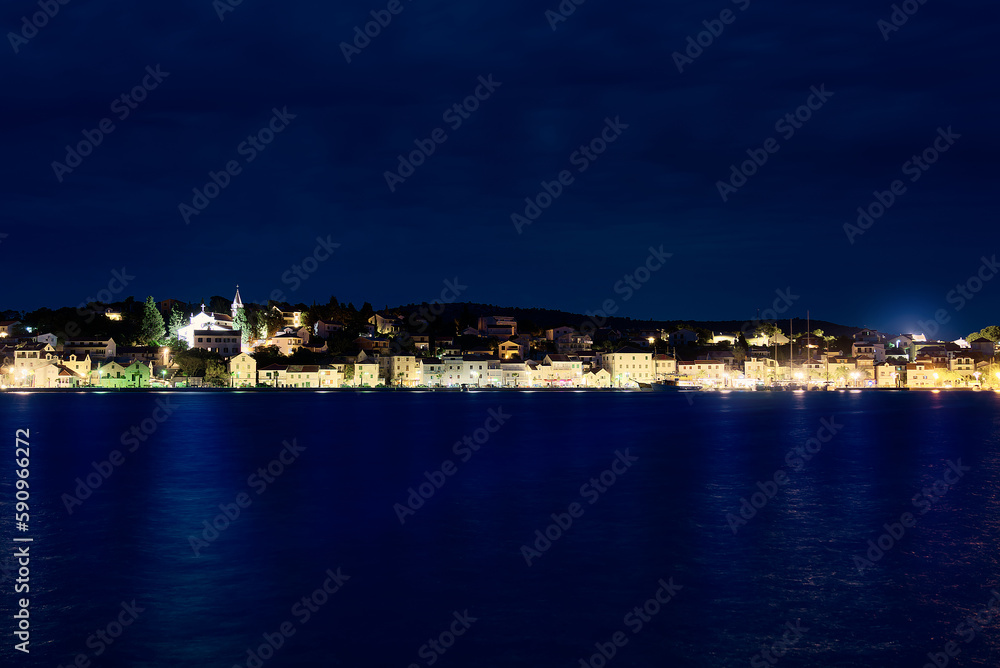 Night panorama of Rogoznica. Adriatic town of Rogoznica aerial coastline view, central Dalmatia region of Croatia.