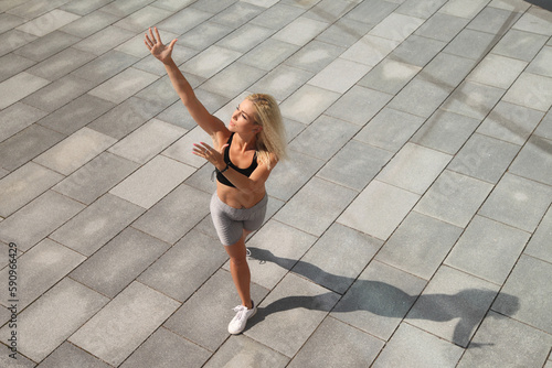 fitness woman with a sports figure doing stretching