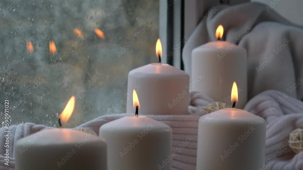 Home fragnance concept autumn holidays at cozy home on the windowsill Hygge aesthetic atmosphere on knitted white sweater. Still life of micro moment candid slow living. Mental health wellbeing Home fragnance concept autumn holidays at cozy home on the windowsill Hygge aesthetic atmosphere on knitted white sweater. Still life of micro moment candid slow living. Mental health wellbeing