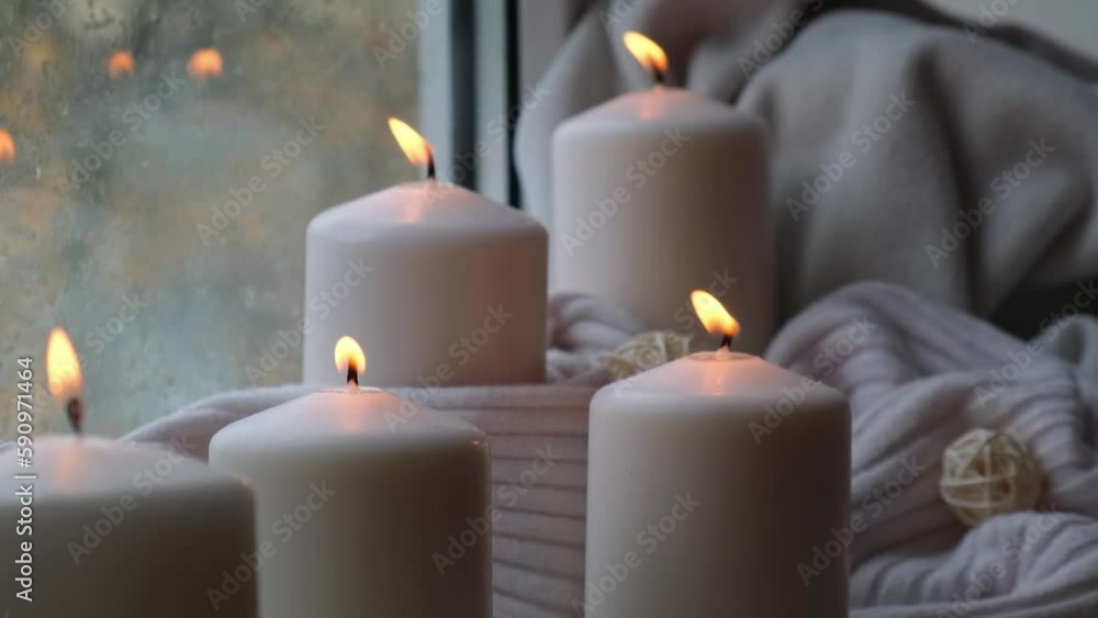 Home fragnance concept autumn holidays at cozy home on the windowsill Hygge aesthetic atmosphere on knitted white sweater. Still life of micro moment candid slow living. Mental health wellbeing Home fragnance concept autumn holidays at cozy home on the windowsill Hygge aesthetic atmosphere on knitted white sweater. Still life of micro moment candid slow living. Mental health wellbeing
