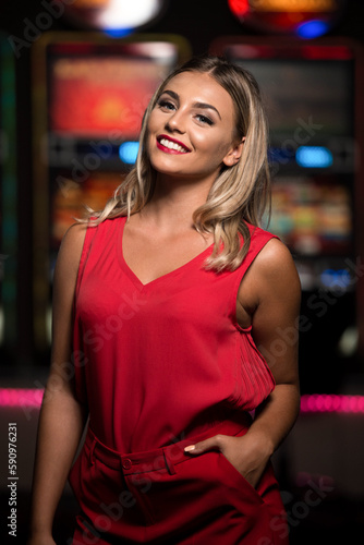 Portrait of a Young Caucasian Woman in Casino © Jale Ibrak