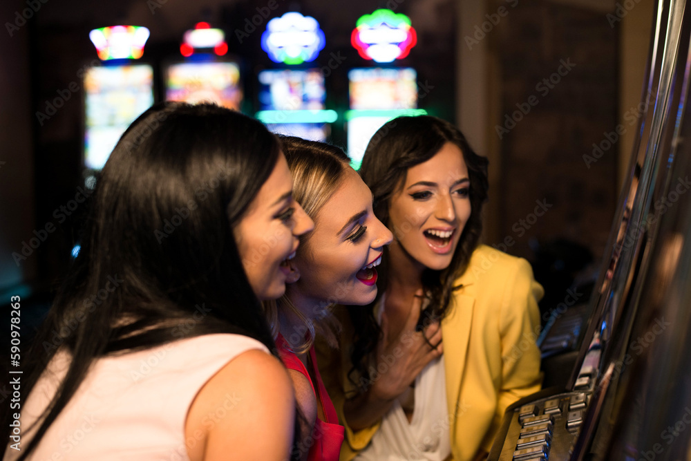 Three Girls at Automat Machine in a Casino