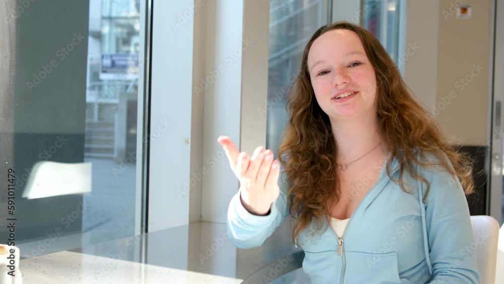 Relaxed girl looking at cell phone with cup of coffee, Shopping in an online store. High quality 4k footage