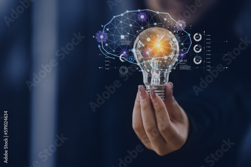 Innovative technology in science and industrial, Woman hand holding light bulb and innovation icon network connection, Creative, new ideas.