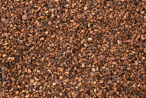 Organic Dried Natural Pomegranate Peel Background on Shutter Stock Images. dehydrated Pomegranate coarse cuts. Pomegranate chips. Natural ingredients background or pattern or texture.