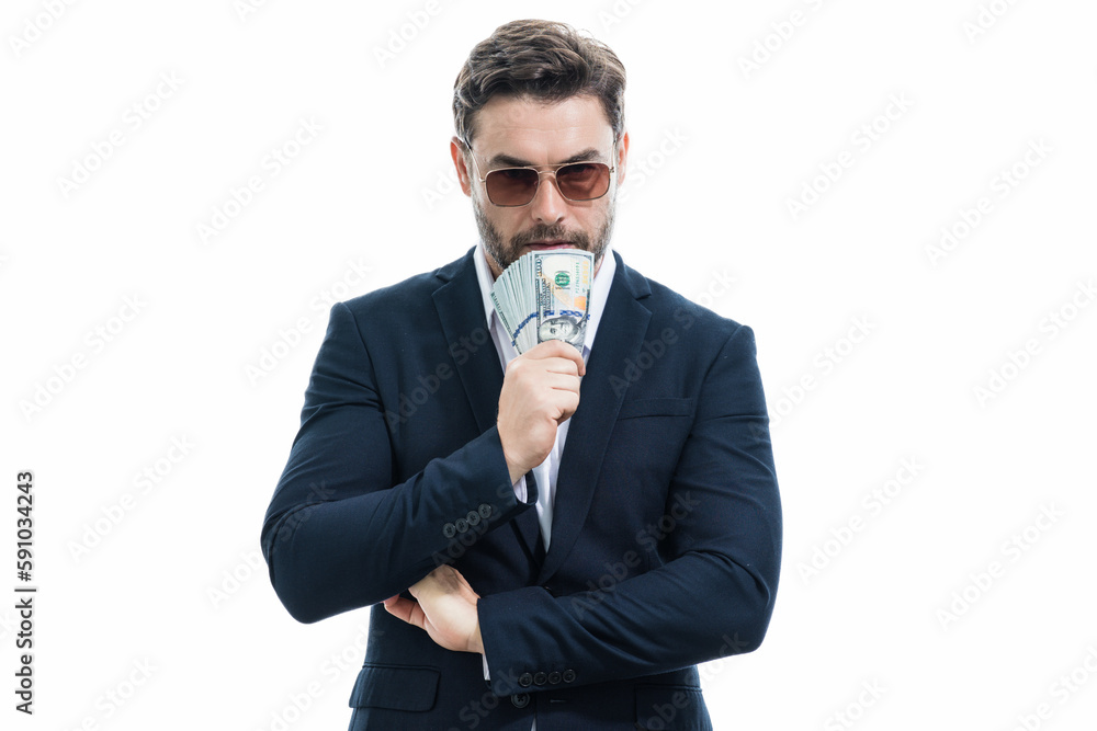Good payment. Handsome business man holding money isolated over grey studio. Money in dollar banknotes. Pile of cash, finance, investment and money saving. Good payment. Handsome business man holding money isolated over grey studio. Money in dollar banknotes. Pile of cash, finance, investment and money saving.
