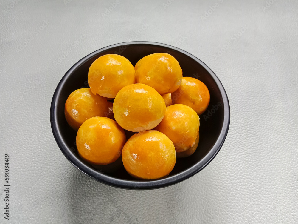 Nastar, Nastar Cookies or Pineapple tarts are small, bite-size tart filled with pineapple jam. Indonesian cookies popular during Eid Mubarak. Nastar, Nastar Cookies or Pineapple tarts are small, bite-size tart filled with pineapple jam. Indonesian cookies popular during Eid Mubarak.
