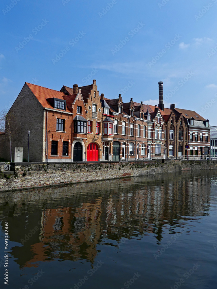 Bruges, April 2023: Magnificent facades of the buildings of Bruges, the Venice of the North