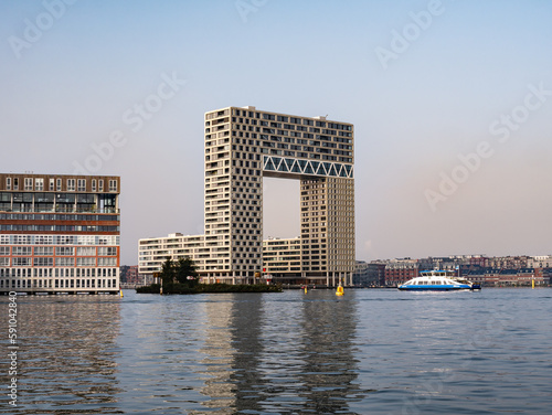 Modern apartment complex Pontsteiger in Houthaven on south bank of river IJ, Amsterdam, Netherlands photo