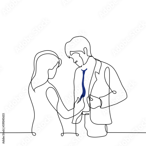 woman corrects a man in a business suit tie, helps to dress, evaluates a tie - one line drawing vector. concept of helping to dress, stylist