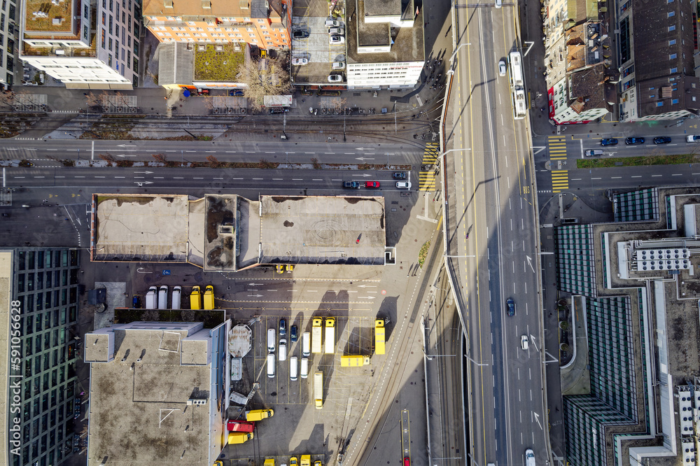 Top view of industrial district of City of Zürich with Hard Bridge and parked trucks on a blue cloudy late winter day. Photo taken March 15th, 2023, Zurich, Switzerland. Top view of industrial district of City of Zürich with Hard Bridge and parked trucks on a blue cloudy late winter day. Photo taken March 15th, 2023, Zurich, Switzerland.