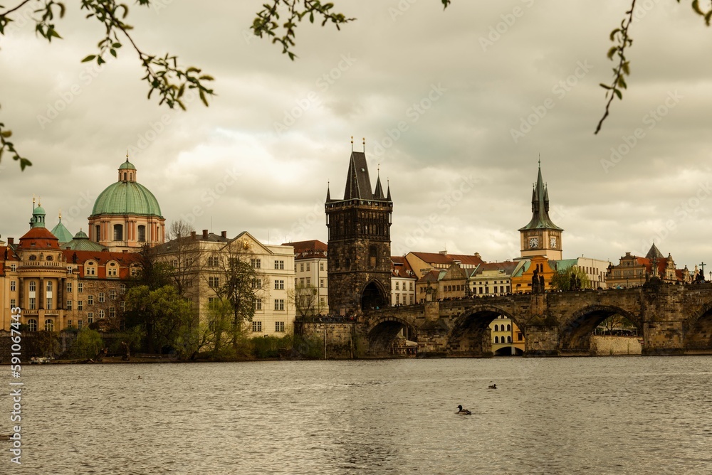 Charles Bridge crossing the Vltava River with the city in the background, Prague, Czech Republic