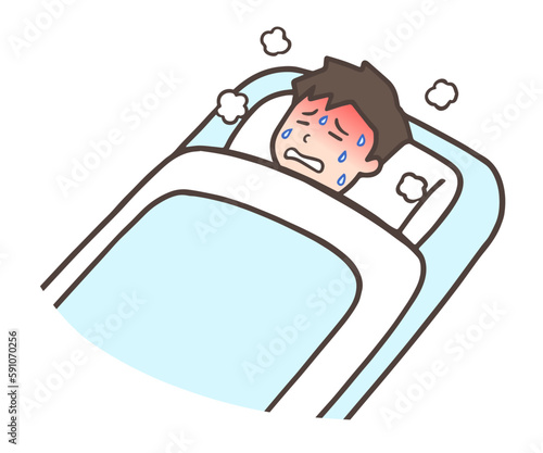 熱が出て布団で寝ている男性