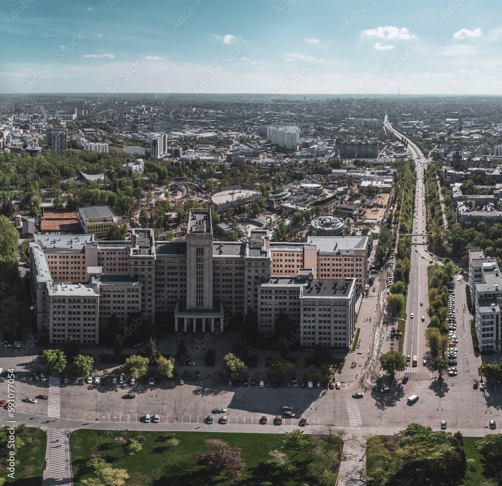 Aerial panorama view on Karazin National University building on Freedom Square, city streets in spring. Kharkiv, Ukraine