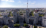 Aerial view on Derzhprom building with blue sky cloudscape in spring Kharkiv city center, Ukraine. Architecture destination sightseeing