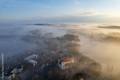 Aerial beautiful spring morning fog view of Trakai Castle, Lithuania