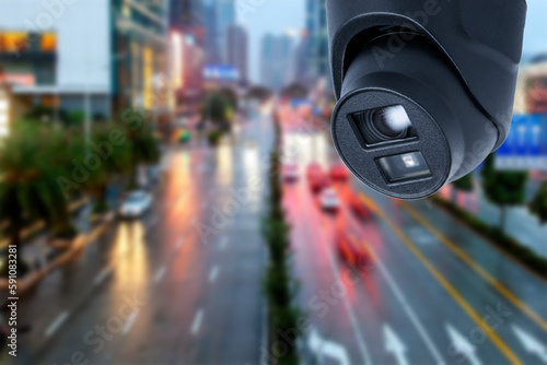 CCTV Camera or surveillance Operating on traffic road. © Oleksandr
